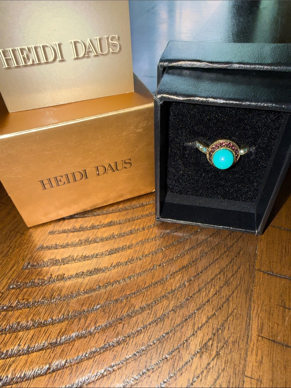 Heidi Daus Gold-Tone Ring with Turquoise Center and Pink Crystal Halo. Size 8